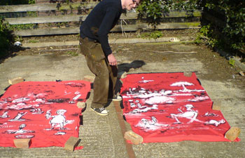 Andy T express drying the first two sheets.