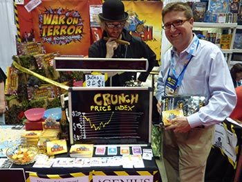 Tom and the banker who paid well over the asking price for the game just so he could spike the market and push the price up for everyone else. Check out that happy grin.