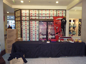 Early doors: Tom covers the shopping centre's only fire exit