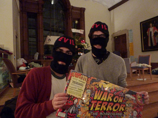 Christmas comes early for two happy - ok - one happy student