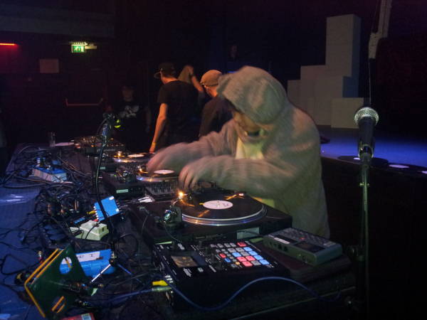 Kid Koala started timing cartoon sound effects to the wrestling on stage behind him. This was hilarious and brilliant.