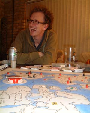 Andy T laughing at the terrorist uprising in the Americas. A closer inspection of the board shows that Andy T only has Iceland to call home, so what's he so happy about?