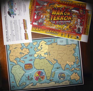 Fresh proofs from the printer: back and front of box and the board