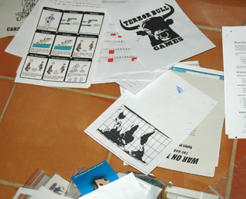 Odds and sods, a Peters map of the world and an early attempt at a TBG logo